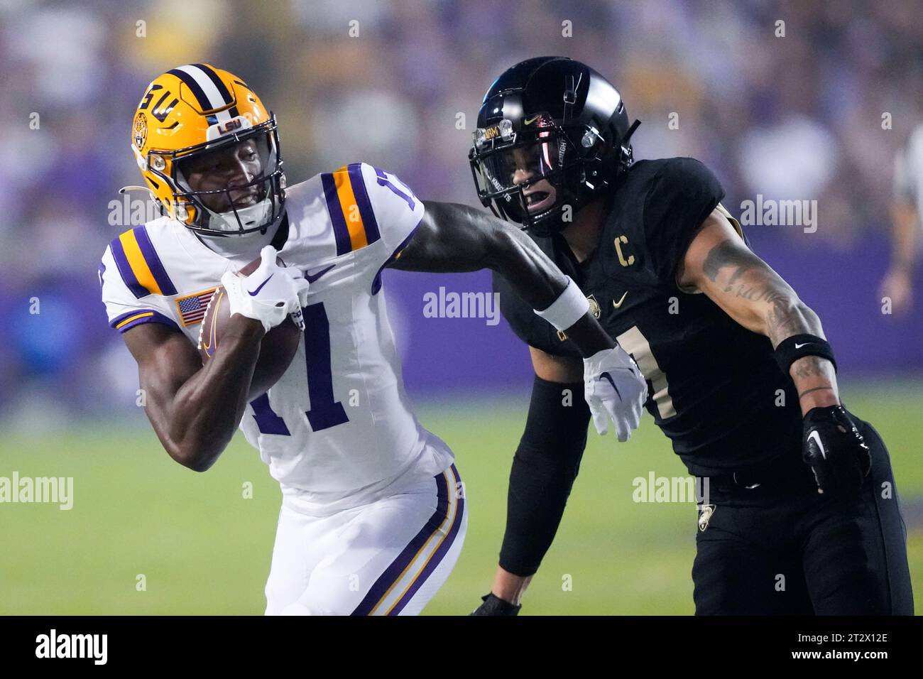 LSU wide receiver Chris Hilton Jr. (17) carries against Army linebacker