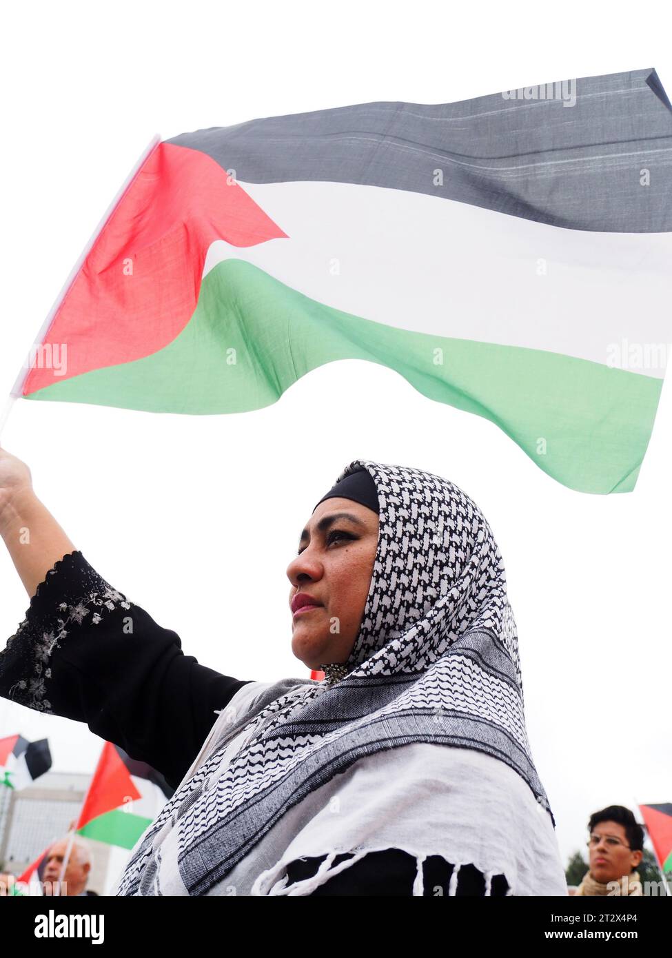Lima, Peru. 21st Oct, 2023. Islamic women waving Palestinian flags when hundreds of demonstrators, summoned by the Boycott, Divestment, Sanctions (BDS) movement, took to the streets in Lima, in support of the Palestinian people and against the Israel - Hamas war in the Gaza Strip. Credit: Fotoholica Press Agency/Alamy Live News Stock Photo