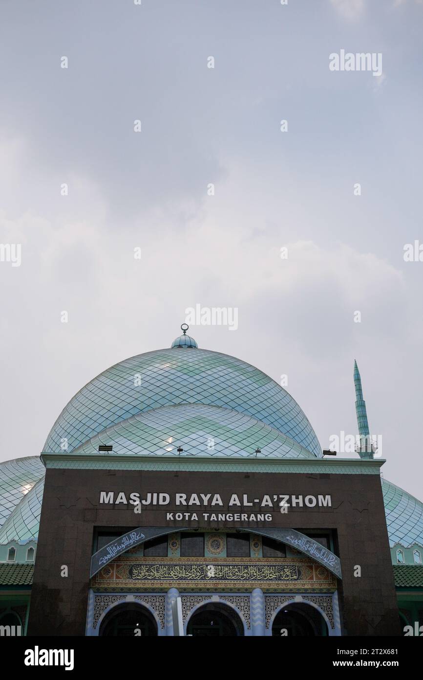 Indonesian. The mosque is the place where Muslims worship, located from the side with a view towards the sky. Stock Photo