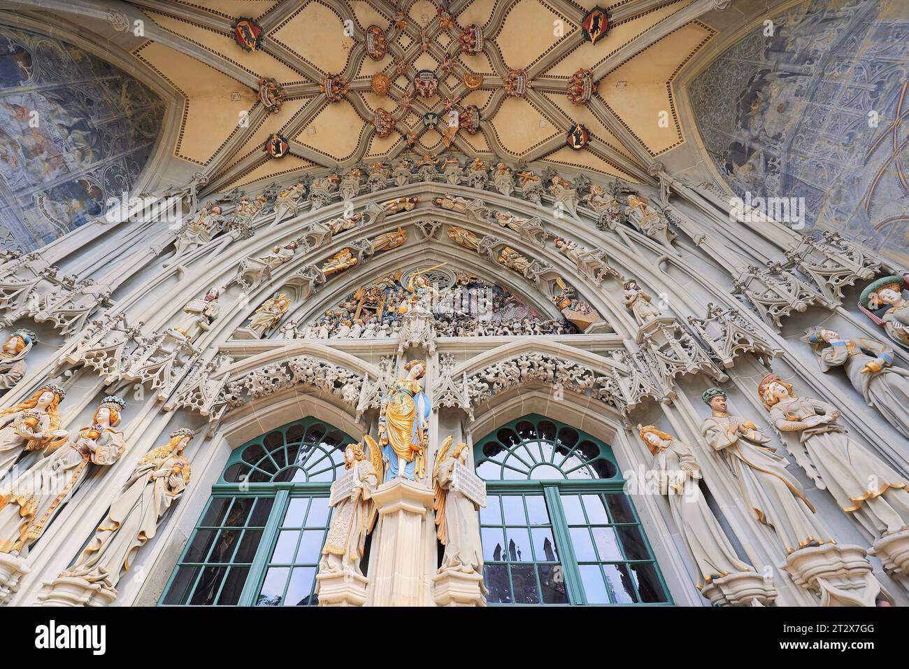 Arch gate of exterior main entrance of Cathedral of Bern, with famous Last Judgement stone carving of 15th century, Bern, Switzerland Stock Photo