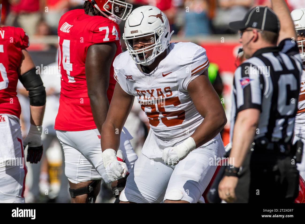 Houston, TX, USA. 21st Oct, 2023. Texas Longhorns defensive lineman Alfred Collins (95) celebrates after making a sack during a game between the Texas Longhorns and the Houston Cougars in Houston, TX. Trask Smith/CSM (Credit Image: © Trask Smith/Cal Sport Media). Credit: csm/Alamy Live News Stock Photo