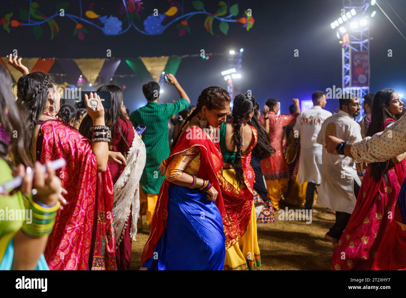 Baroda, India. 16th Oct, 2023. Young indian women in traditional clothes are seen dancing the
