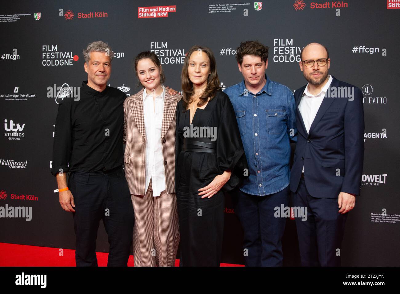 Cologne, Germany. 22nd Oct, 2023. (L-R) Film director Christian Theede, Dominique Devenport, Jeanette Hain, film director Jan-Eric Mack, and writer Adrian Illien are being photographed during the photo call of Davos 1917 at Film Palast in Cologne, Germany, on October 21, 2023, during the Cologne Film Festival 2023. (Photo by Ying Tang/NurPhoto)0 Credit: NurPhoto SRL/Alamy Live News Stock Photo
