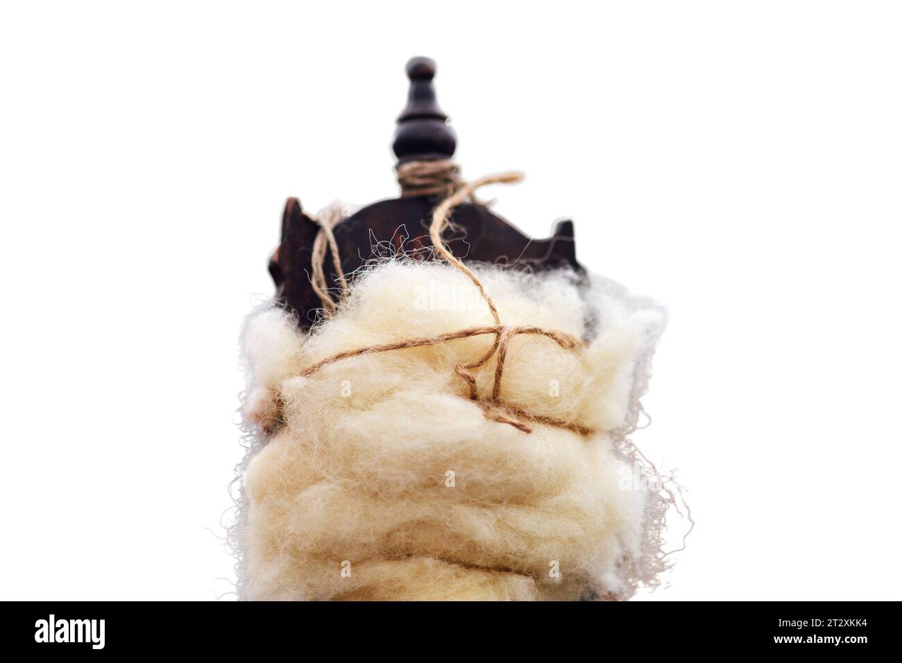 The spinning process involves twisting the fibers of the wool together