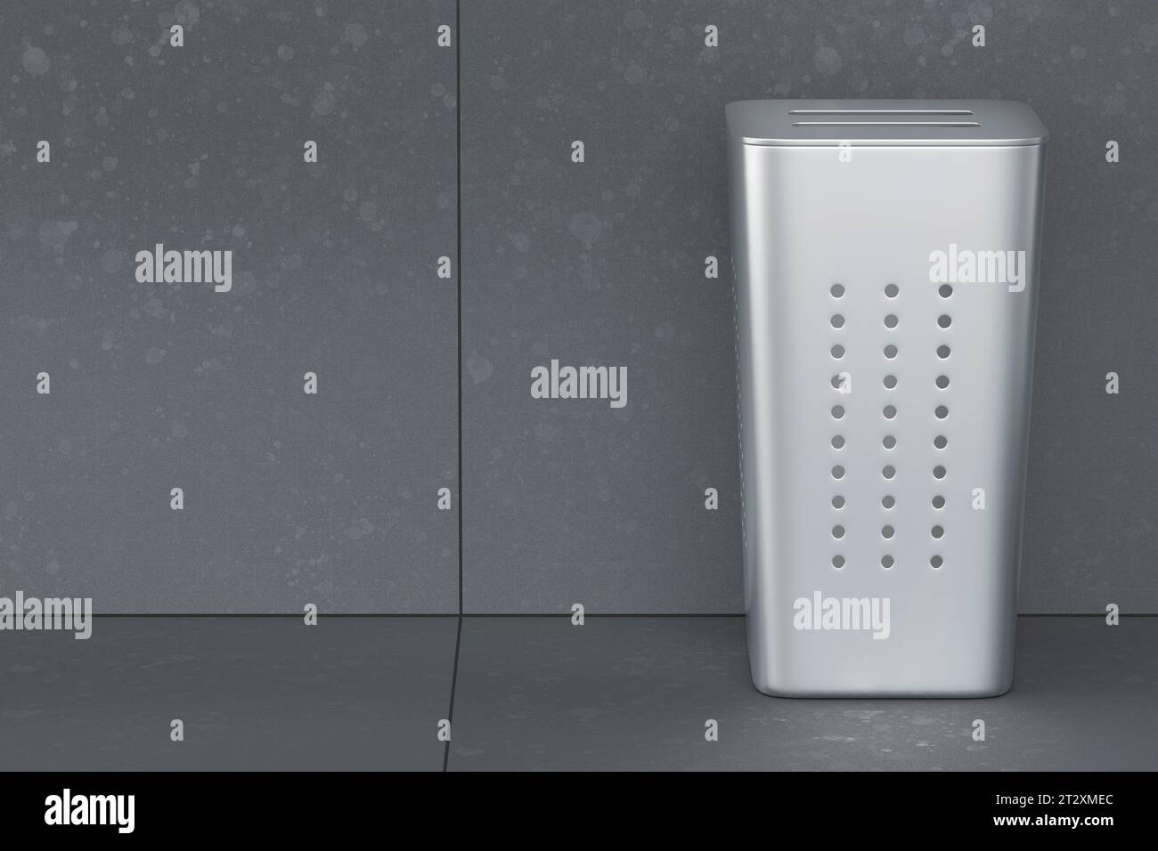 Silver laundry hamper with lid in empty laundry room Stock Photo Alamy