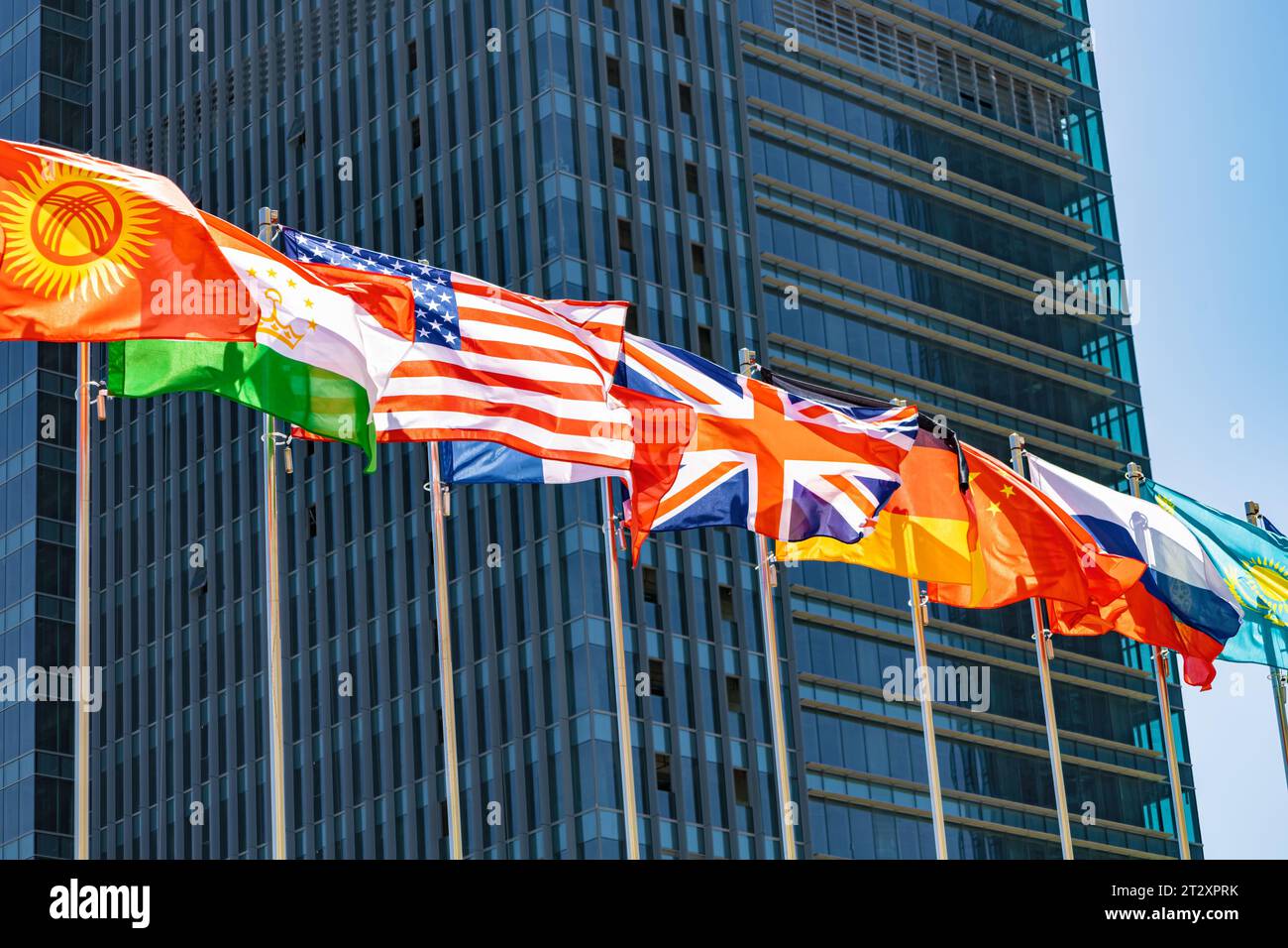 Flags on flagpoles for news topics Stock Photo Alamy