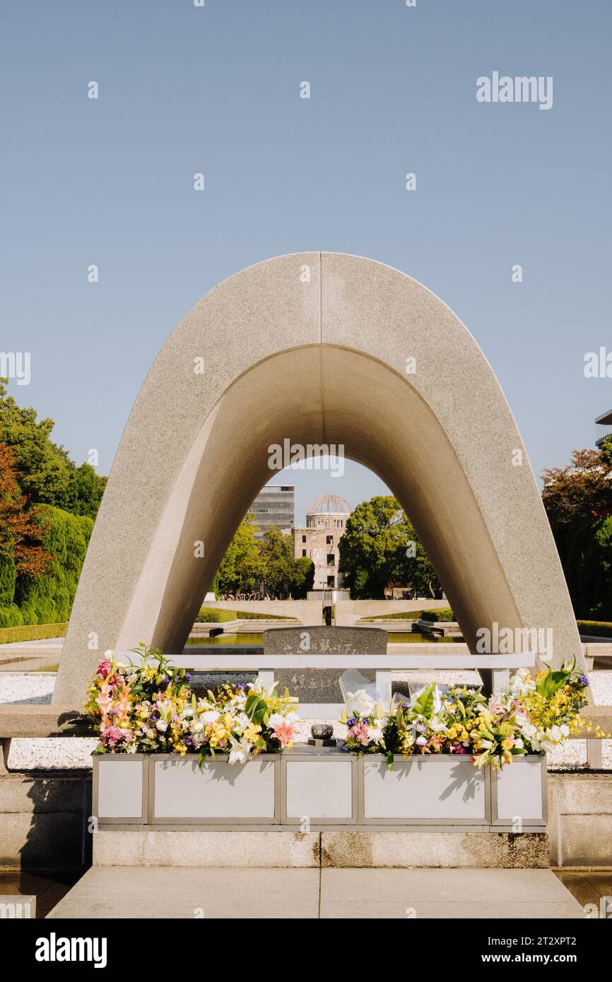 Hiroshima Victims Memorial Cenotaph in the Peace Memorial Park, Hiroshima, Japan Stock Photo