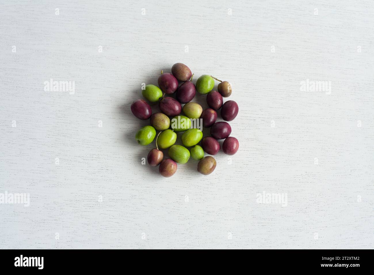 Fresh Olives, Green and Purple Fruits, isolated on white background