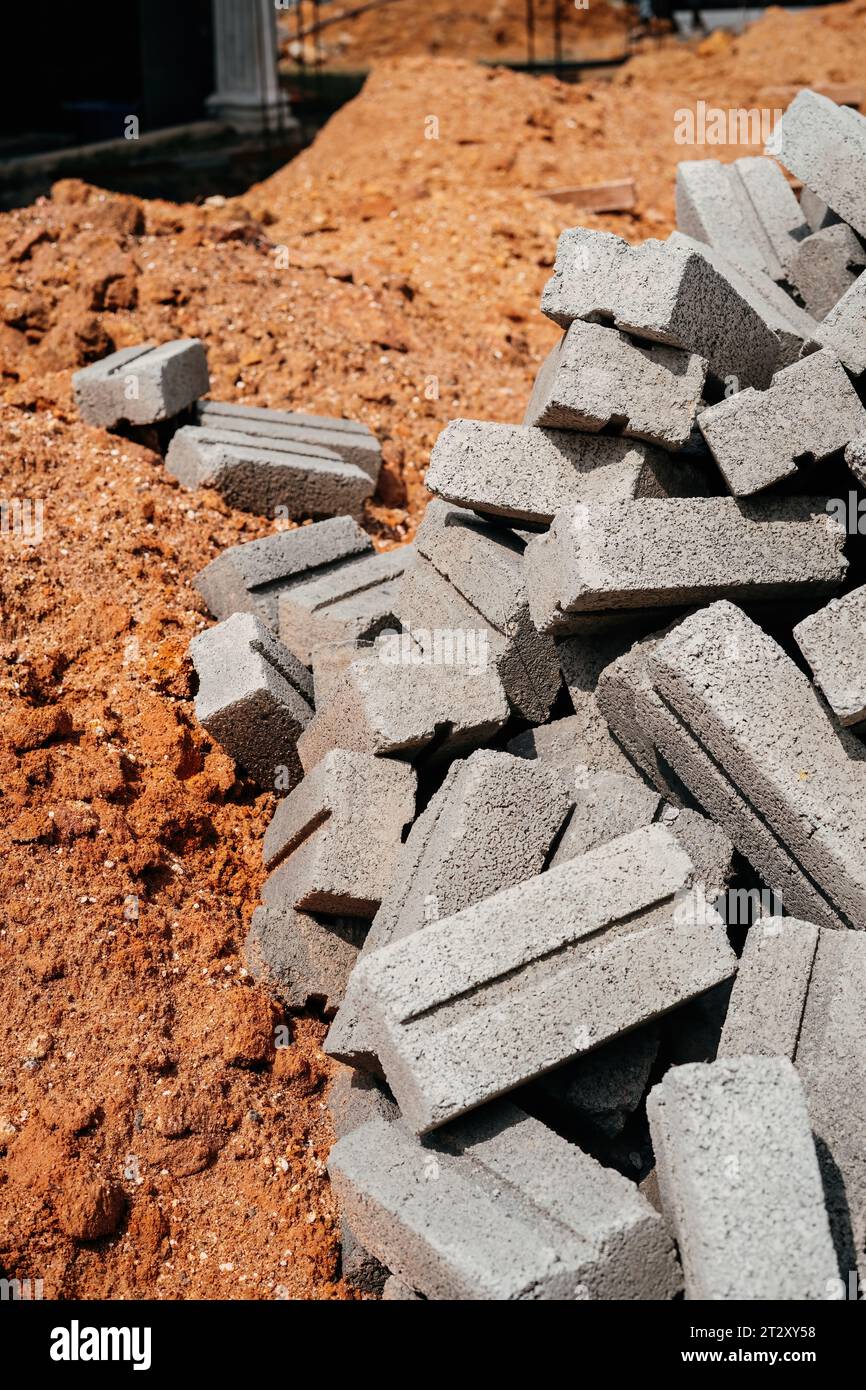 Pile of concrete bricks and sand at the construction site Stock Photo ...