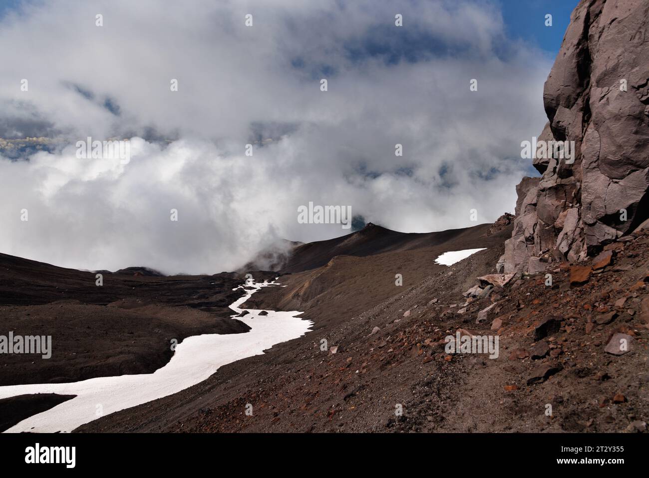 Volcano crater smoke climb hi-res stock photography and images - Alamy