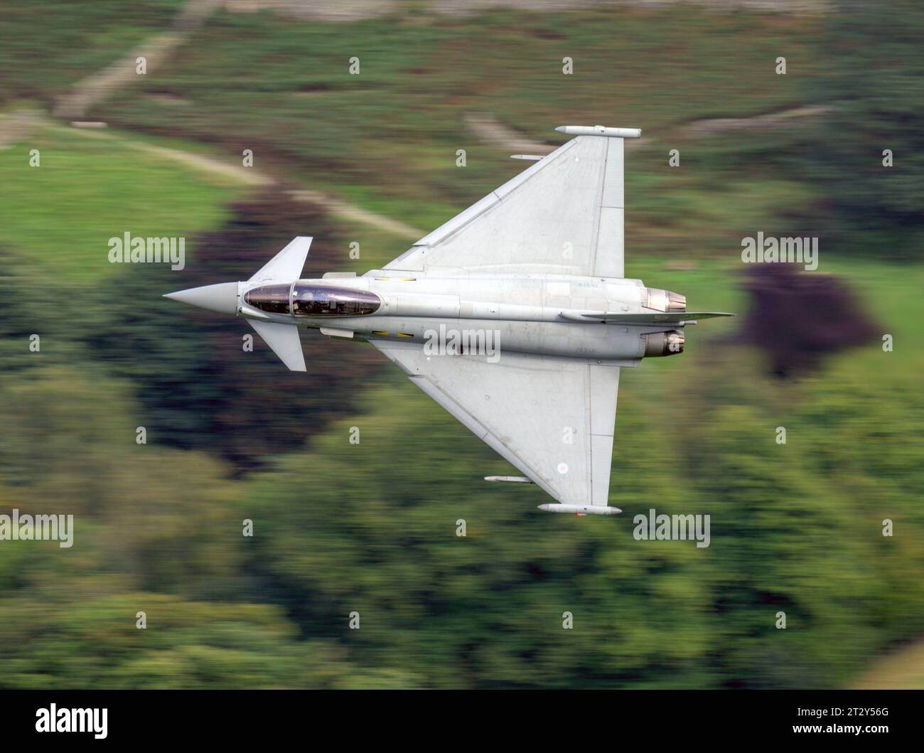 Royal Air Force Eurofighter (Typhoon) FGR4, flying low level at 250ft through the Lake District Low Flying Area (LFA17) Stock Photo