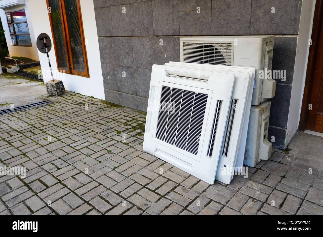 Displaying a stack of faulty AC blowers and dysfunctional hanging AC