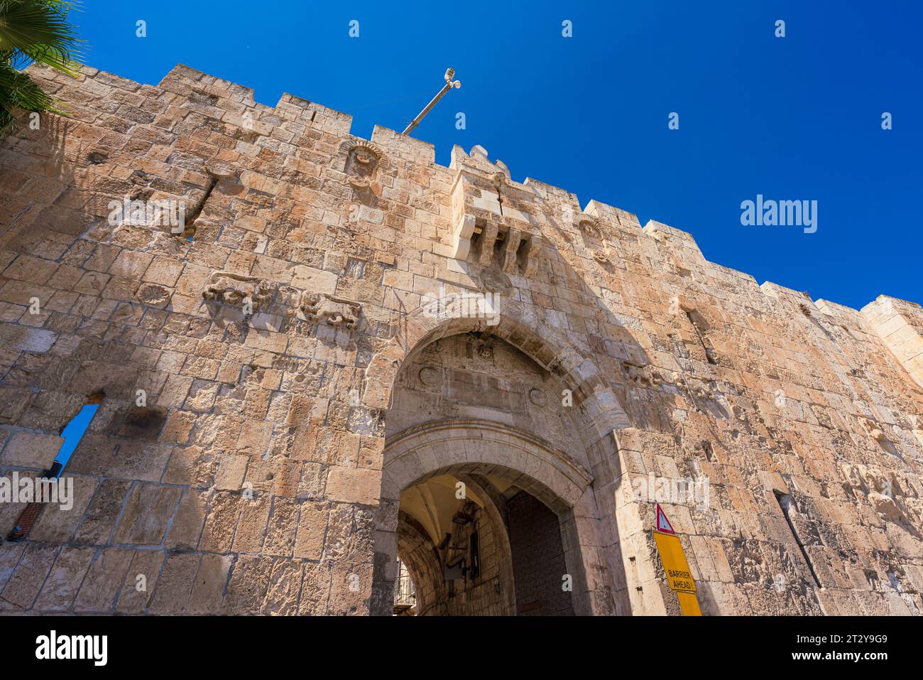 Lions' gate is one of the seven entrances to the Old City of Jerusalem. It is named after the Lions carved on its wall. Stock Photo