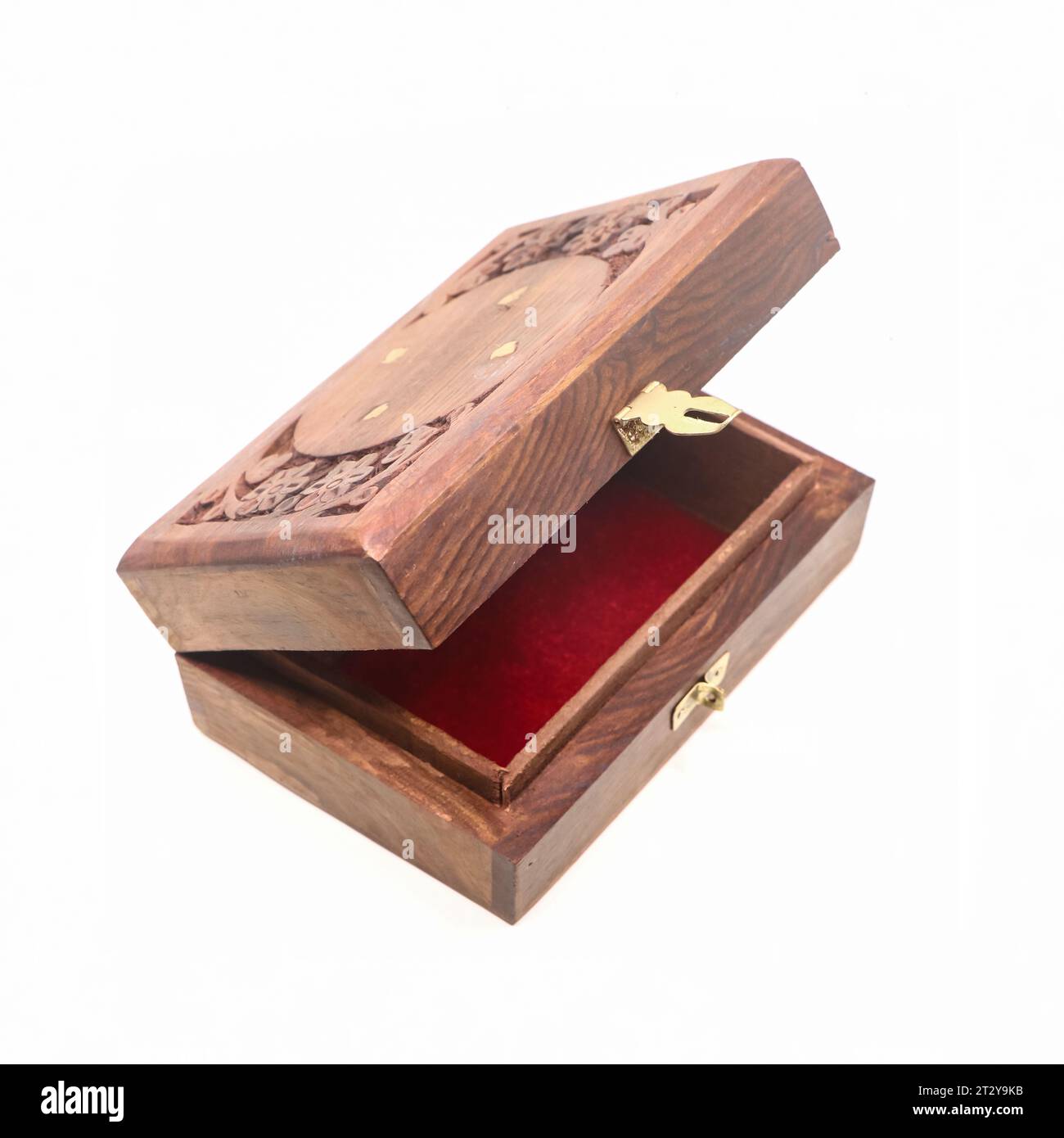 a brown, handcrafted wooden gift box for storing jewellery and money with red velvet lining, empty and open isolated Stock Photo