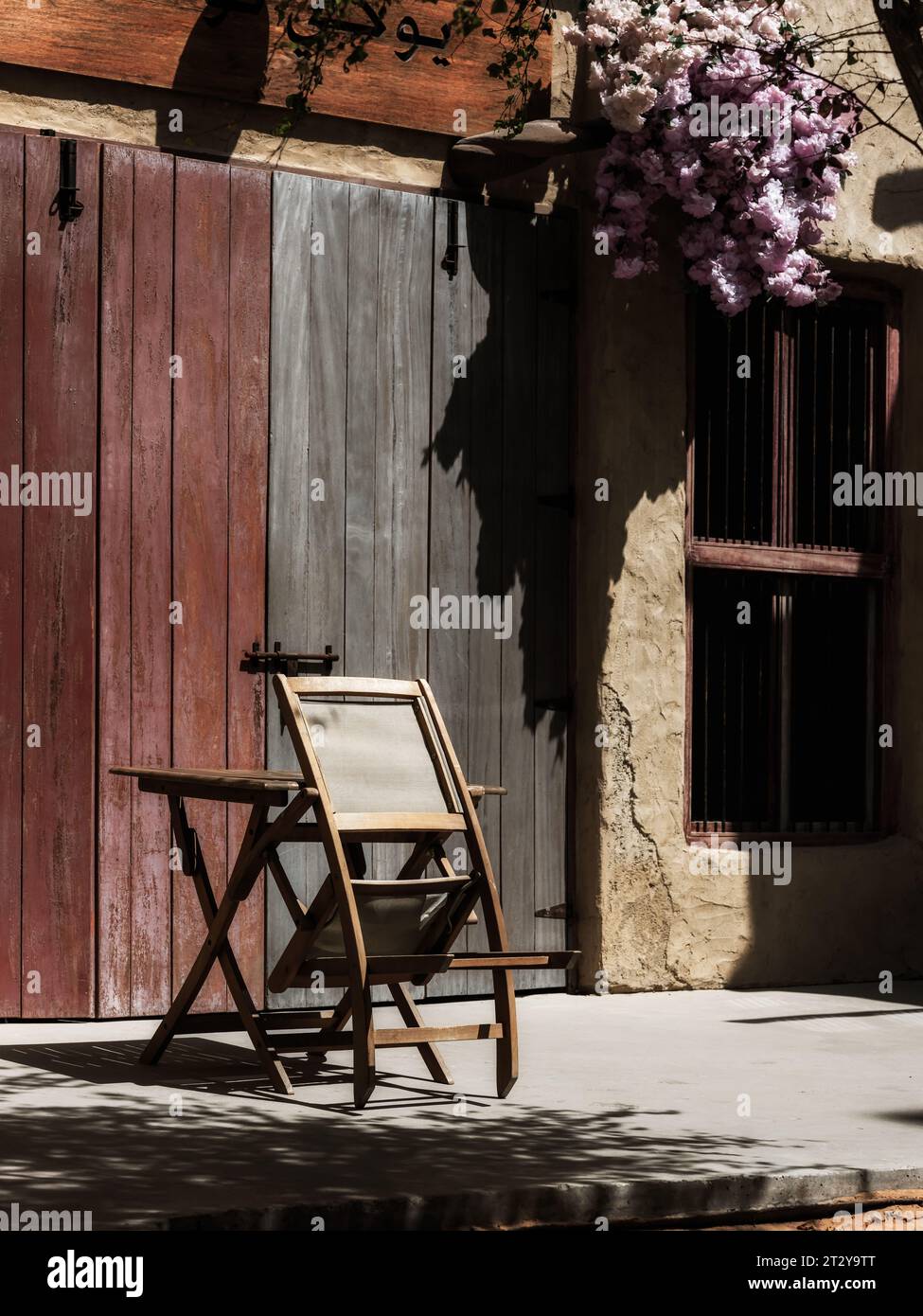 A table and folded chairin  the old market, souk, Dubai,, Middle East Stock Photo