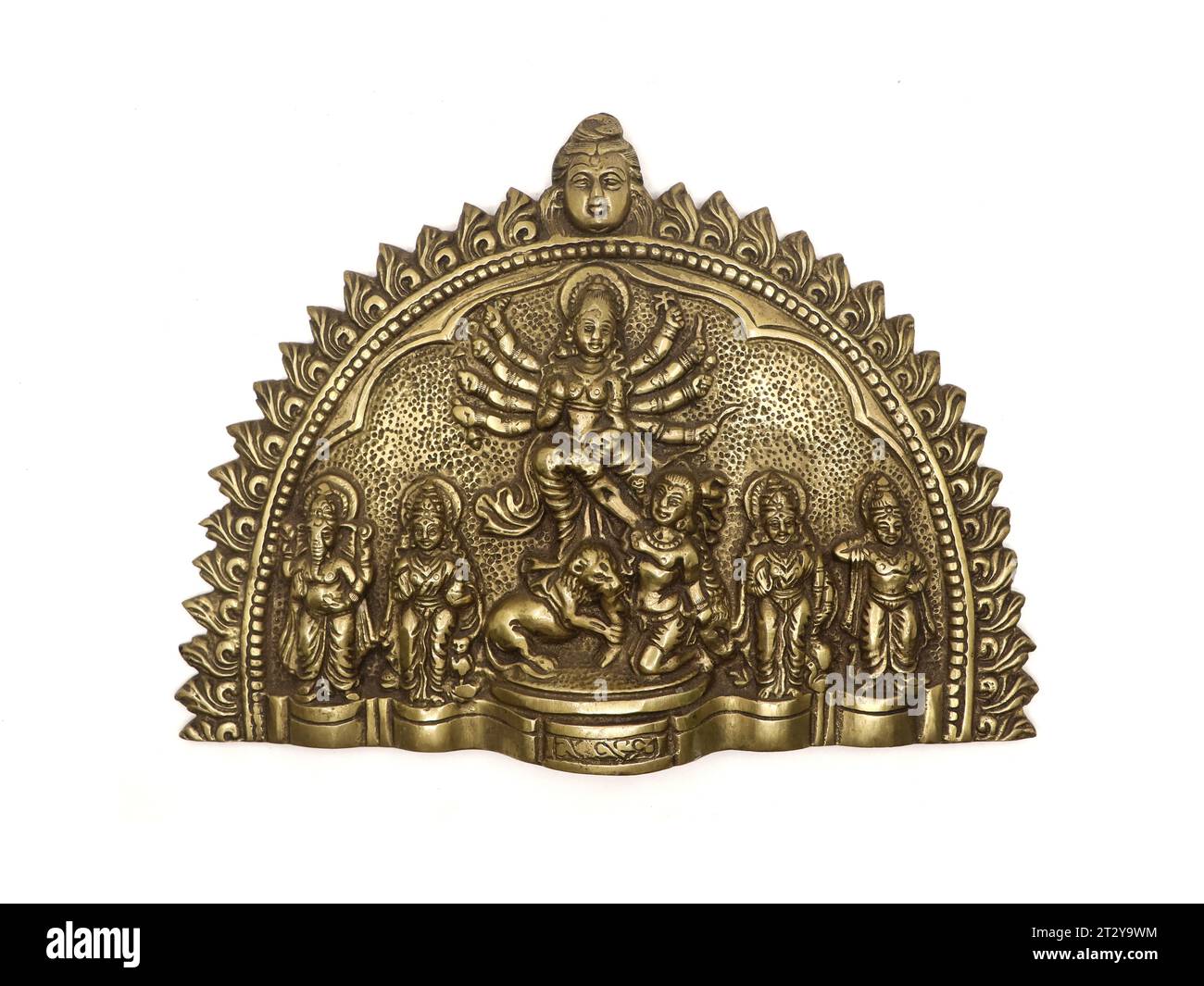 brass handicraft statue of goddess durga of hindu religion slaying demon mahishasura, used during durga pooja festival isolated Stock Photo