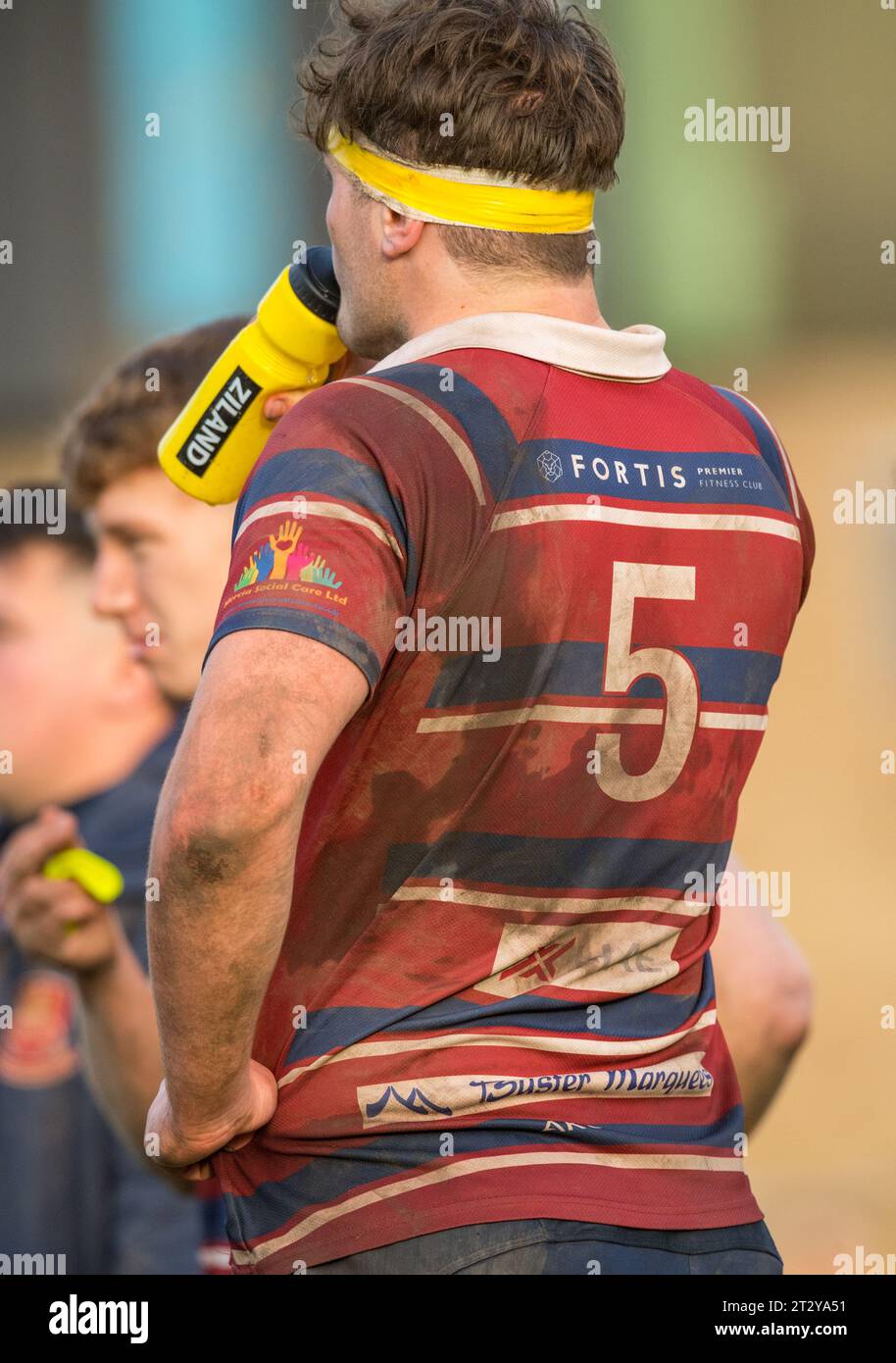 English amateur Rugby Union player with a dirty and muddy number 5