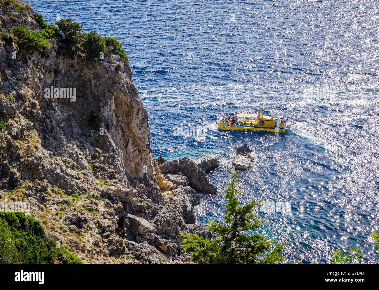 Corfu Sea Discovery glass hulled boat offering a comfortable undersea experience off the Corfu coast near Paleokastritsa in the Greek Ionian Islands Stock Photo