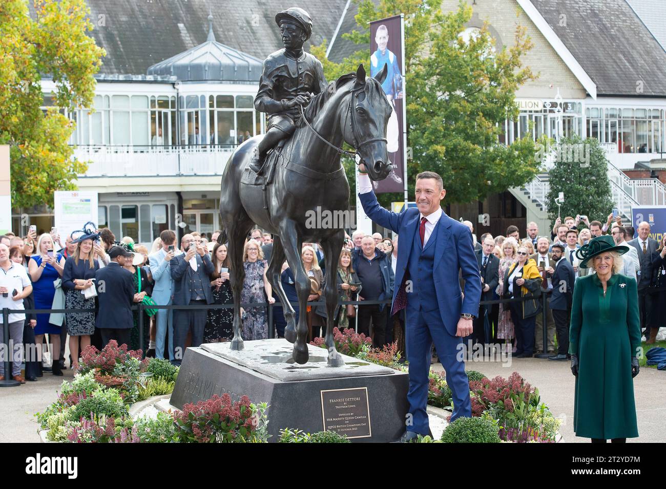 Ascot, Berkshire, UK. 21st October, 2023. Her Majesty Queen Camilla was at the unveiling of a statue of jockey Frankie Dettori at the QIPCO British Champions Day today at Ascot Recourse. The sculpture was designed by artist and sculptor Tristram Lewis. Frankie Dettori said “Ascot has been everything to me – my first Group 1 winner when I was 19 – it is where it all started and concludes with nine Gold Cups, seven King Georges, 81 winners at Royal Ascot and hopefully some victories today'.  “It’s wonderful to be immortalised at such a great track, and to have your own statue while you are still Stock Photo