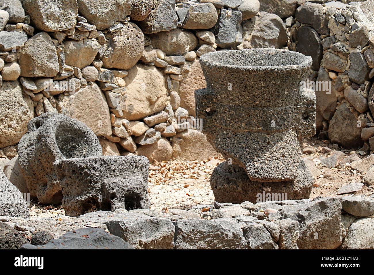 Old ancient artifacts from middle ages among stones in Palestine Stock Photo