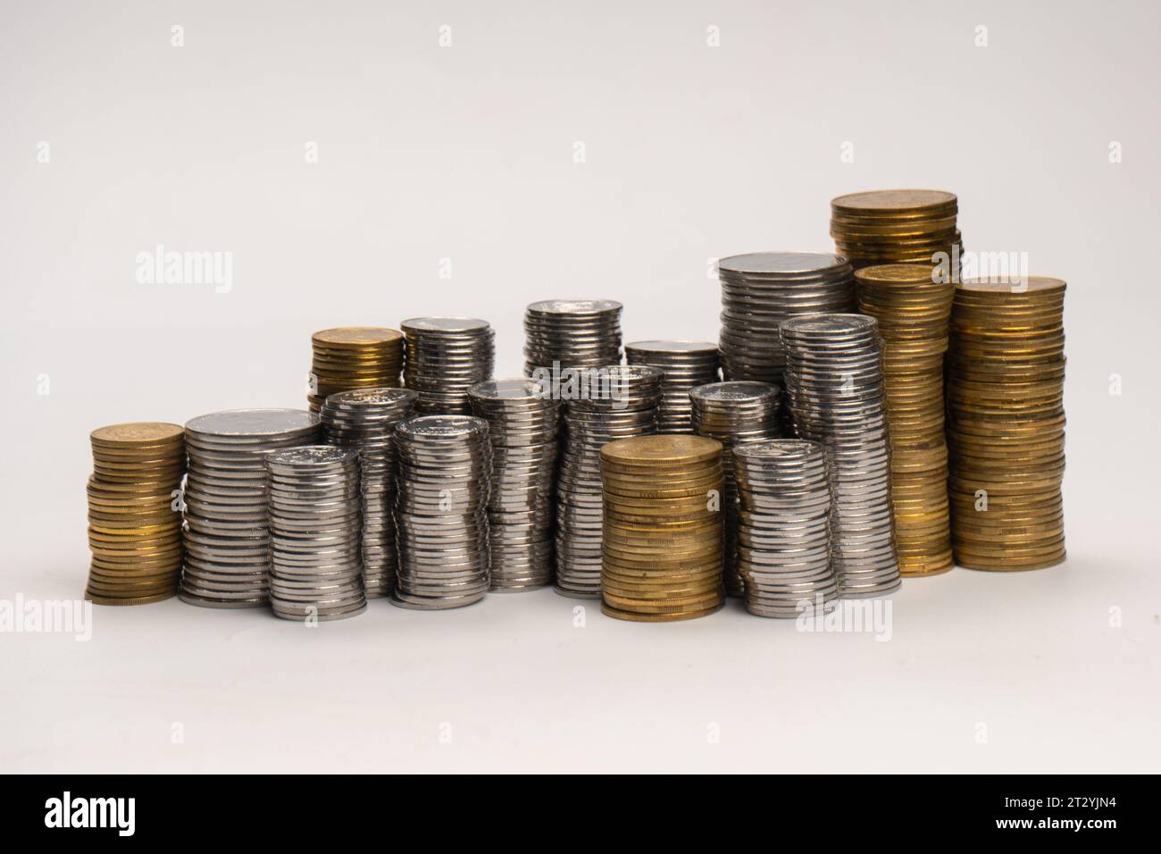 Pile of coins isolated on a white background. Banking and money. Stock Photo