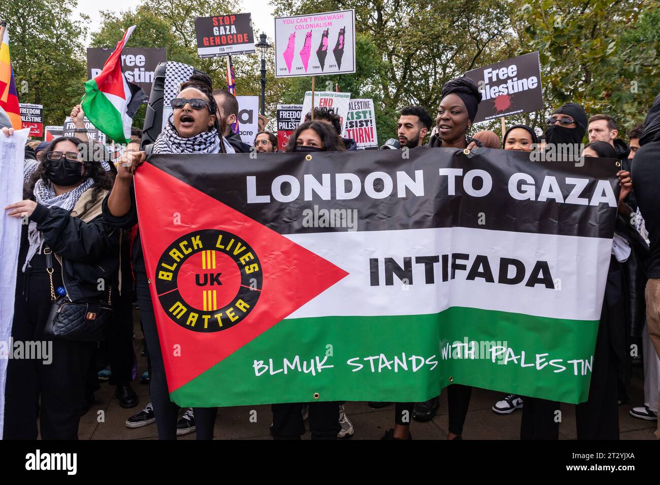 Black Lives Matter Intifada banner at a Free Palestine protest in London following the escalation of the conflict in Israel and Gaza. BLM UK Stock Photo