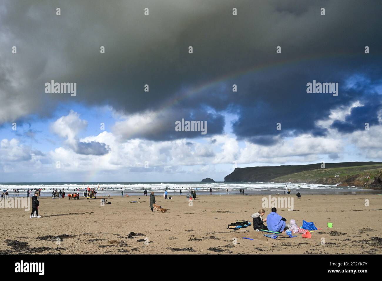 Polzeath, Cornwall, UK. 22nd October 2023. UK Weather. The sea at Polzeath was packed today for the start of half term week, as sunshine came after early morning showers. Credit Simon Maycock / Alamy Live News. Stock Photo