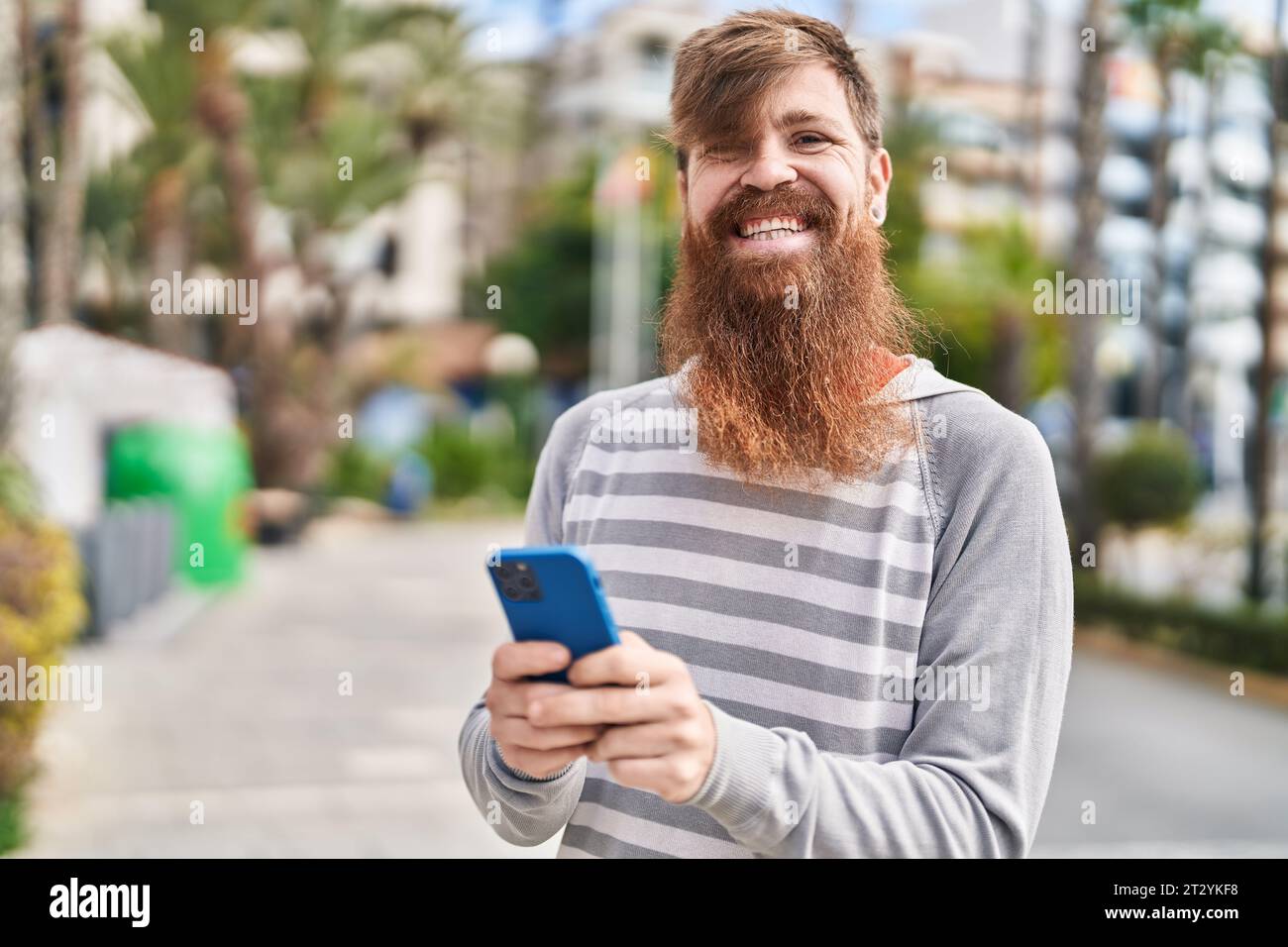 Confident redhead man using hi-res stock photography and images - Alamy