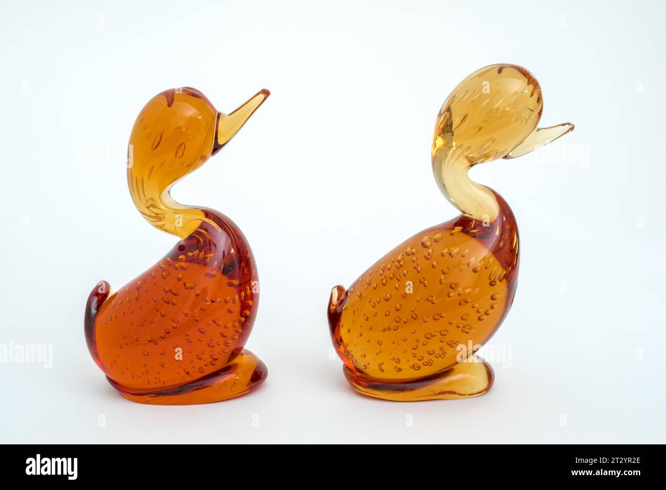 Whitefriars Ducks in Gold and Amber Glass from the late 1970s handmade by Ronnie Wilkinson Stock Photo