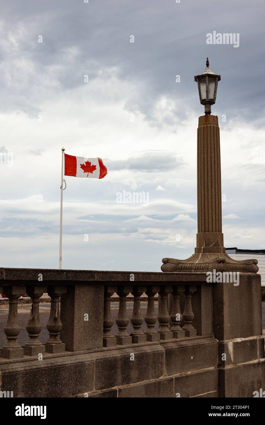 Canadian flag at the memorial to the Canadian troops who were based in Worthing, West Sussex, UK during the World Wars Stock Photo