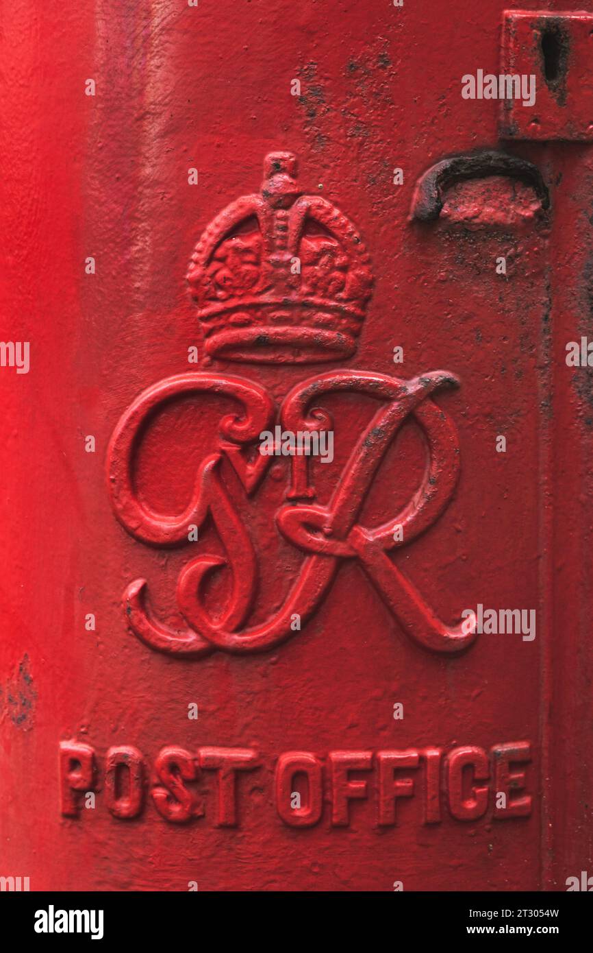 Red post box (G VI R) on the street in Worthing, West Sussex Stock Photo