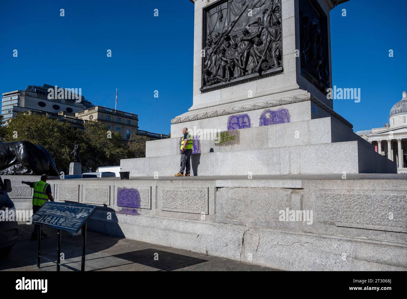 London UK 22 October 2023 Workmen Clean Graffiti From The Base Of london-uk-22-october-2023-workmen-clean-graffiti-from-the-base-of