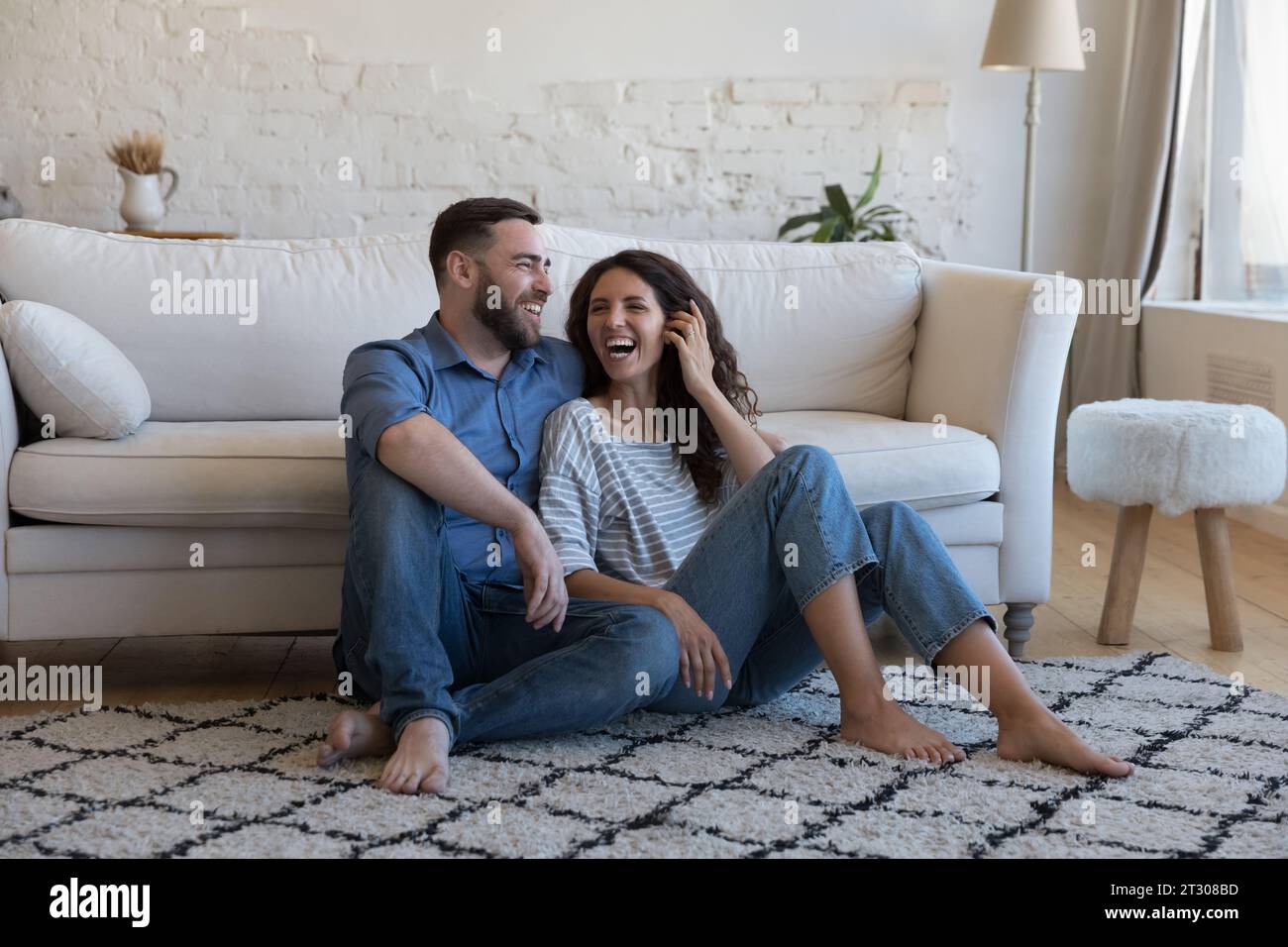Couple resting floor hi-res stock photography and images - Alamy
