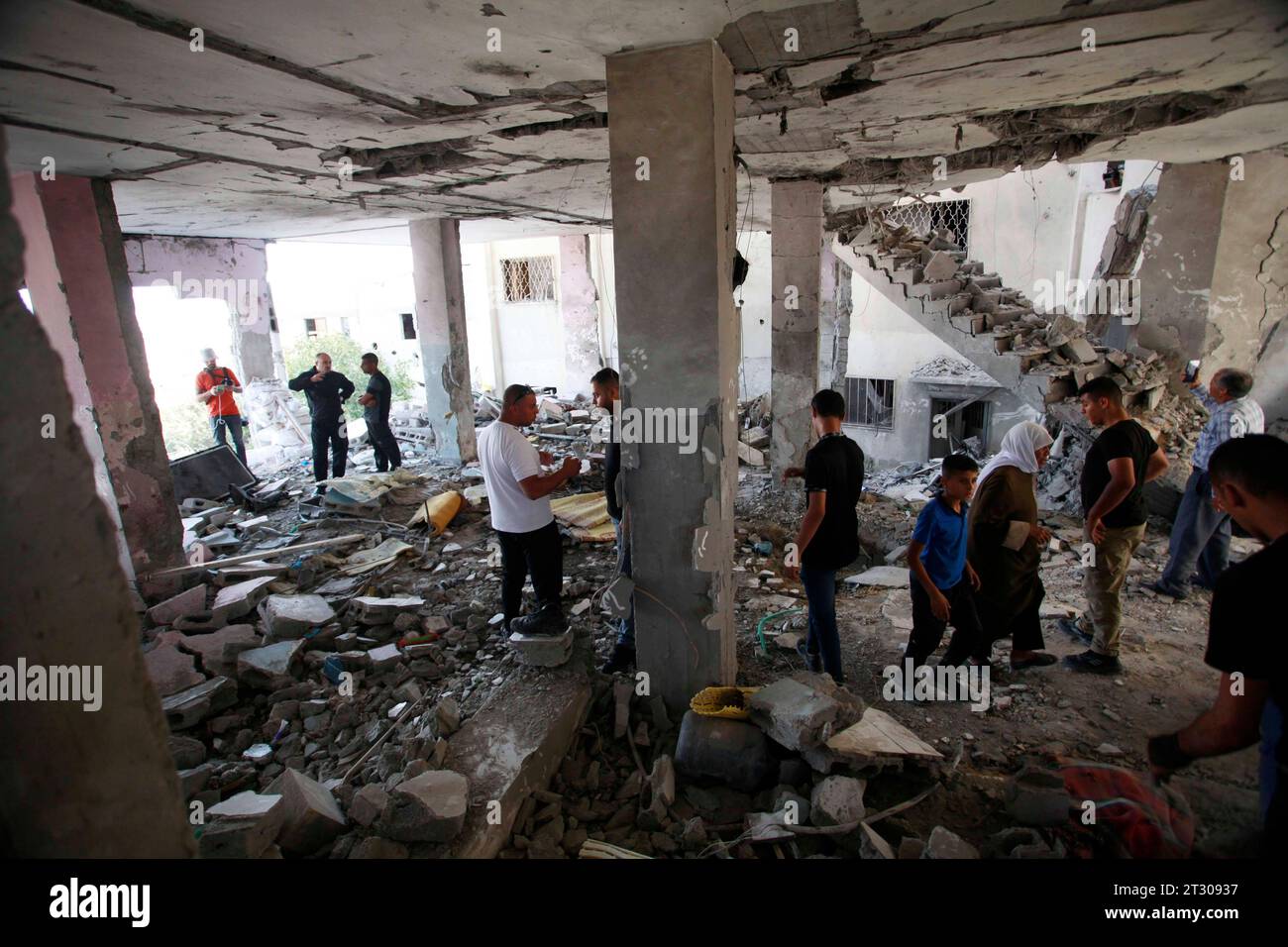 Jenin Checkpoint People check the damage inside a building in the occupied West Bank ...