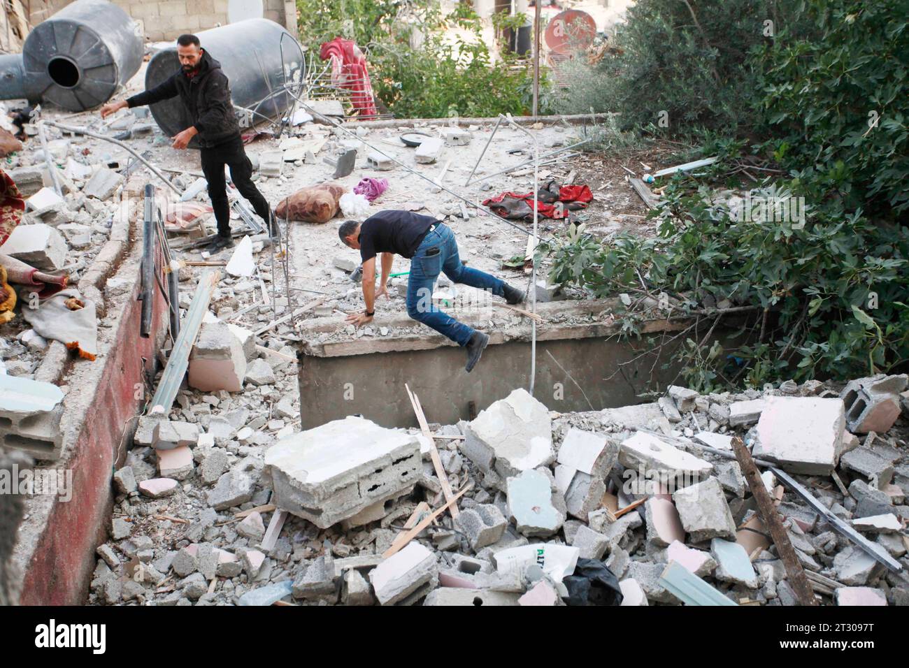 Jenin Checkpoint People check the damage inside a building in the occupied West Bank ...