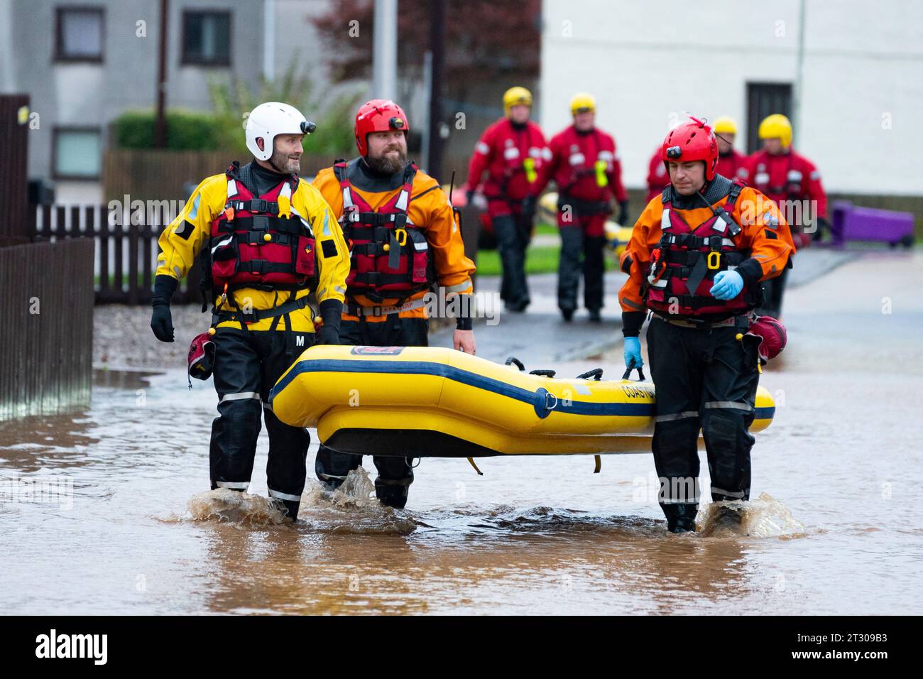 Views of flooded streets and coastguards during rescue in Brechin after the River South Esk broke flood defences during Storm Babet , Angus, Scotland, Stock Photo