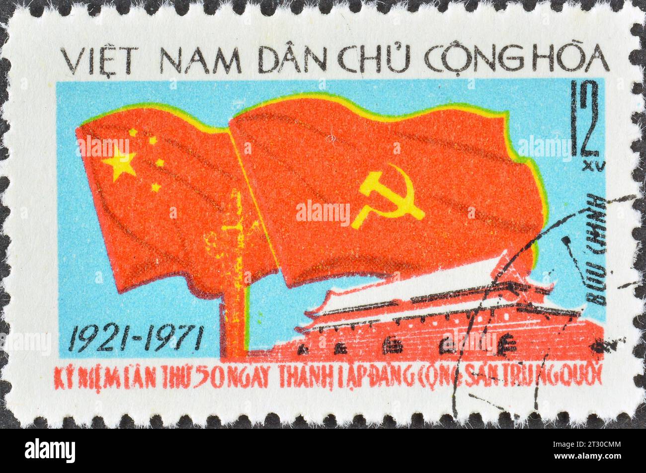 Cancelled postage stamp printed by Vietnam, that shows Flags of China