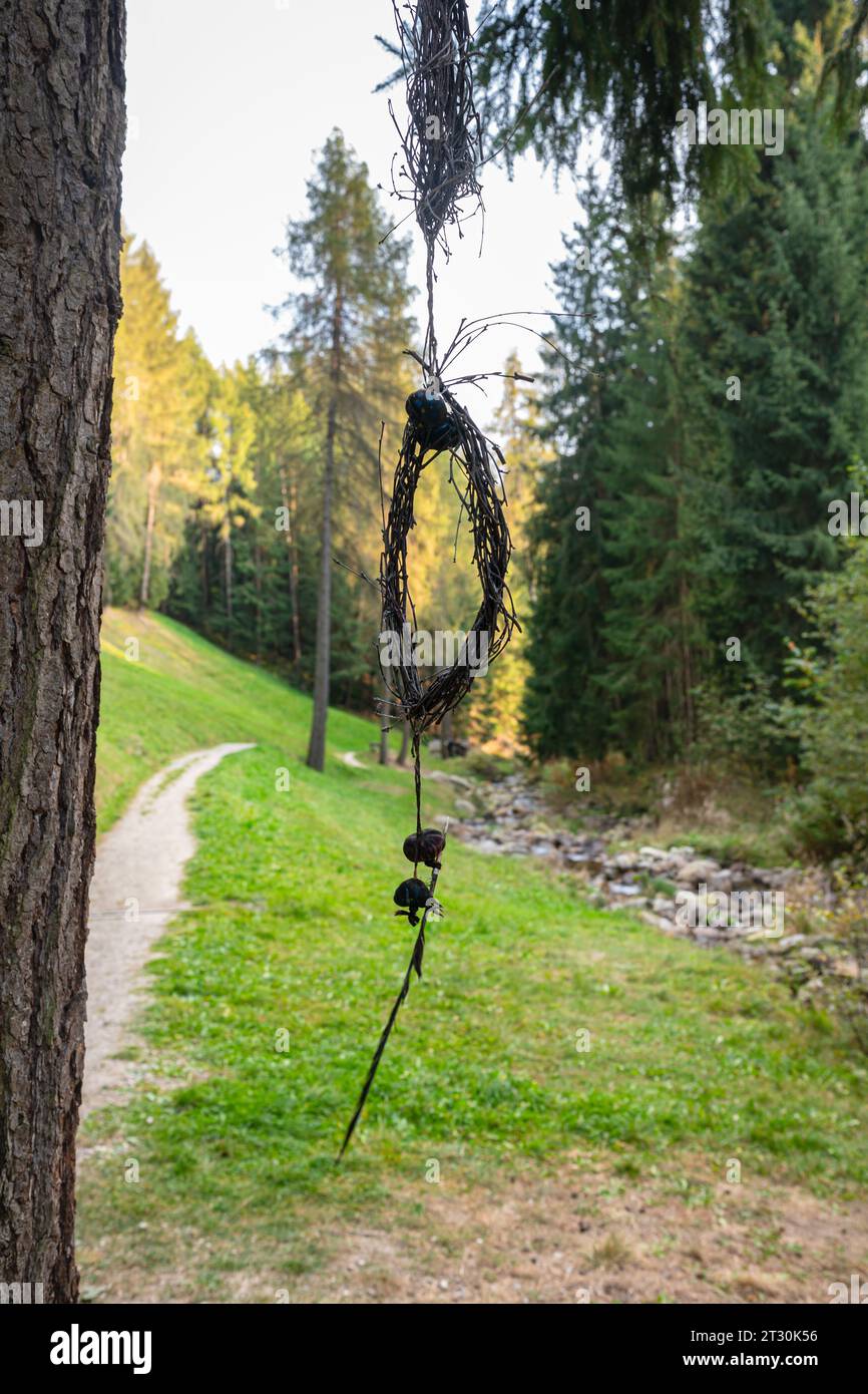 Interwoven branches are hung on a tree in South Tyrol which may have special meaning. Stock Photo