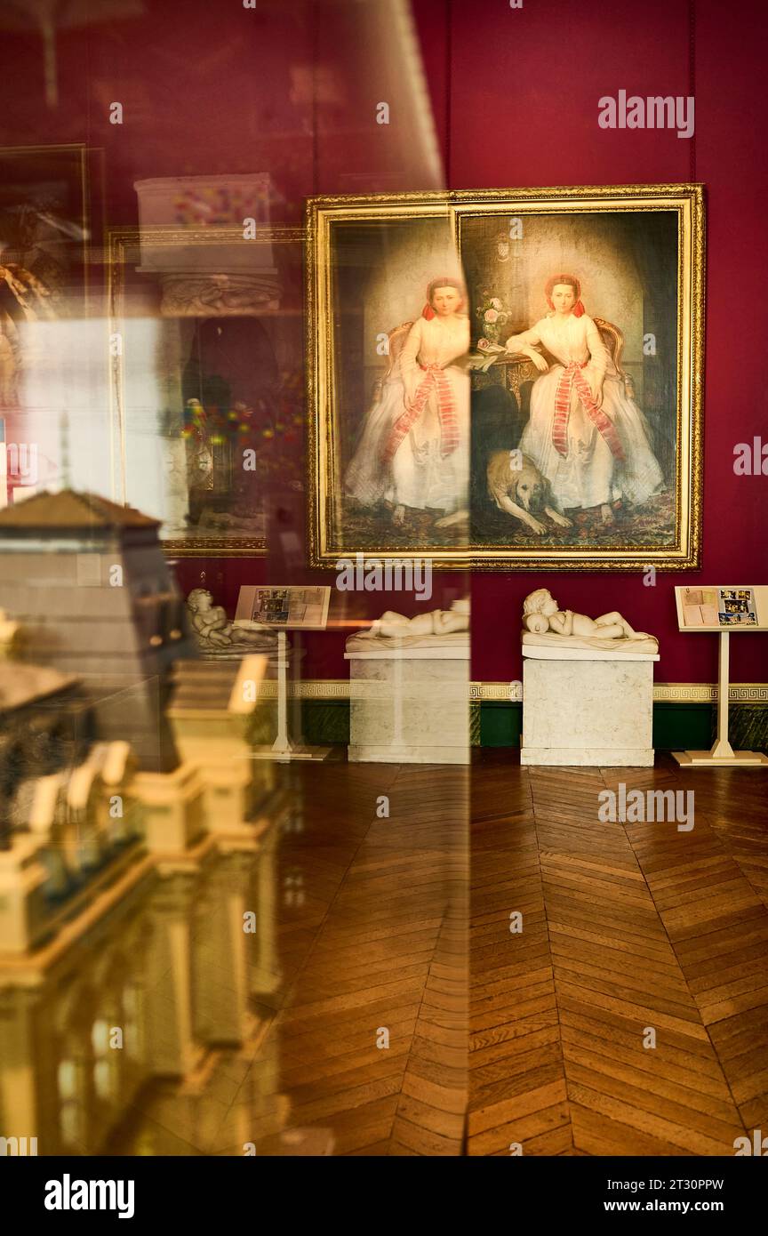 Portrait of Josephine Boyes reflected in a glass display cabinet at the Bowes Museum Stock Photo