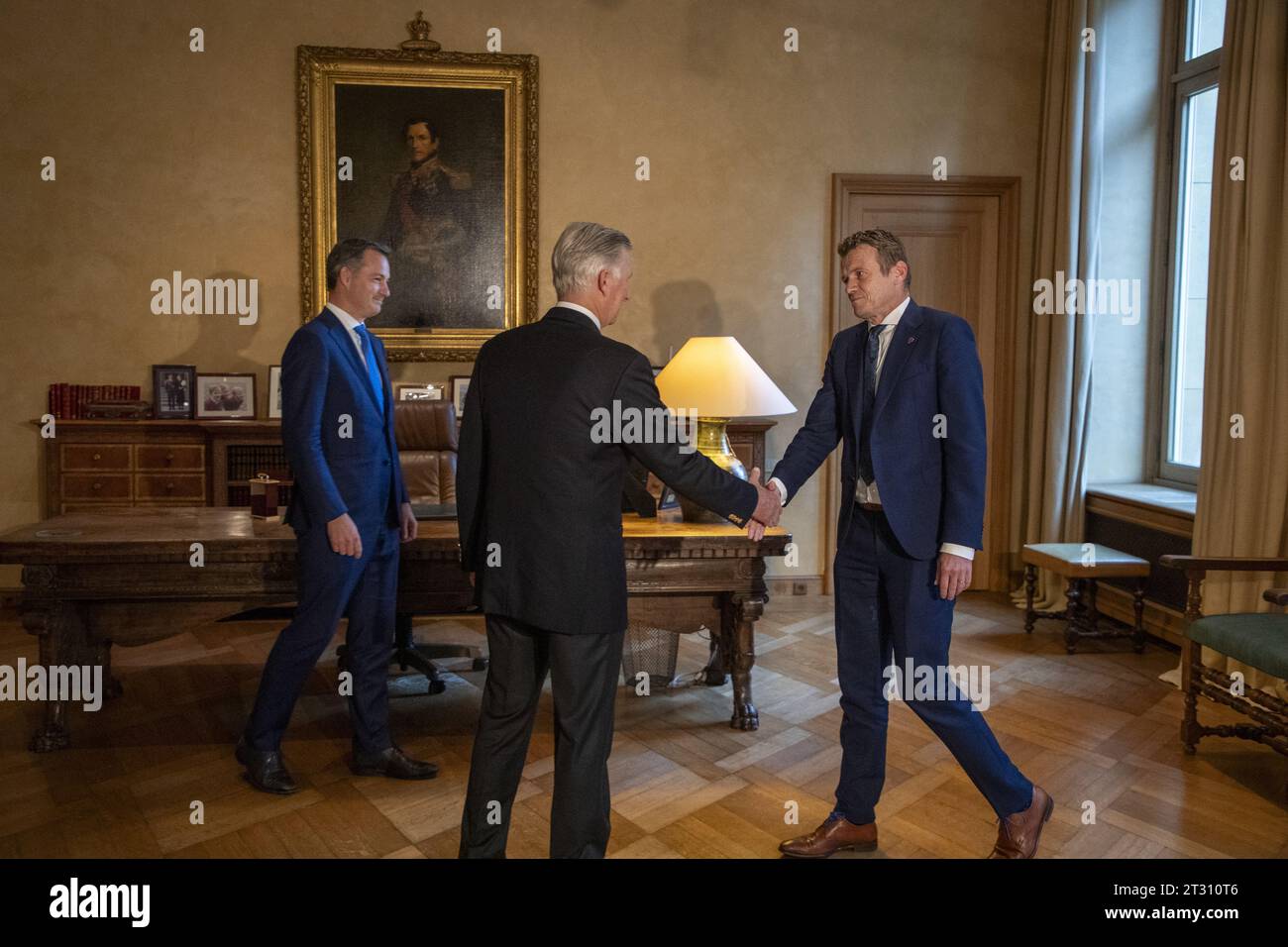 Brussels, Belgium. 22nd Oct, 2023. Prime Minister Alexander De Croo, King Philippe - Filip of Belgium and Newly appointed Minister of Justice Paul Van Tigchelt pictured after the oath ceremony of the new Minister for Justice at the Royal Palace in Brussels on Sunday 22 October 2023. BELGA PHOTO NICOLAS MAETERLINCK Credit: Belga News Agency/Alamy Live News Stock Photo
