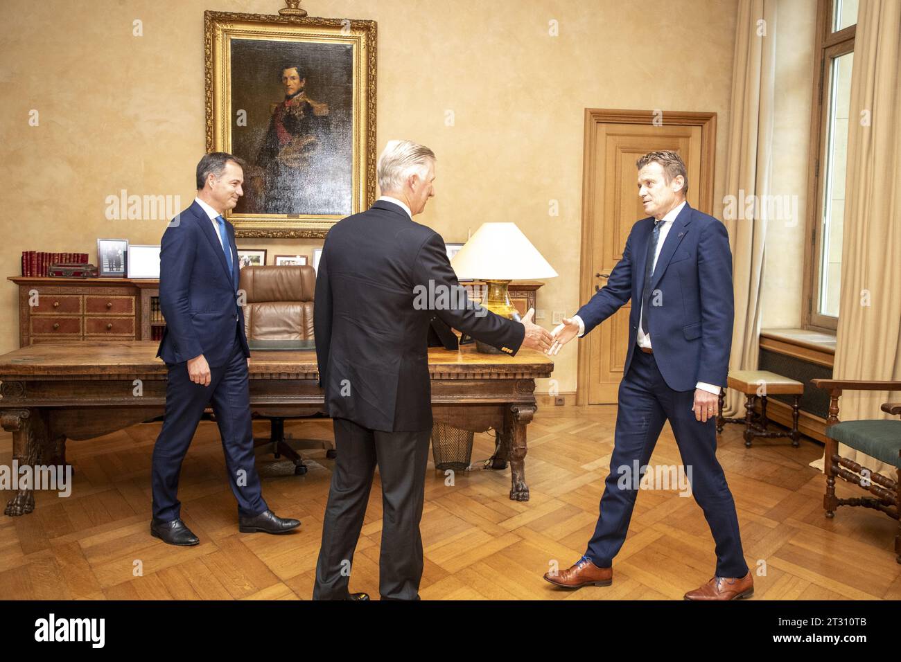 Brussels, Belgium. 22nd Oct, 2023. Prime Minister Alexander De Croo, King Philippe - Filip of Belgium and Newly appointed Minister of Justice Paul Van Tigchelt pictured after the oath ceremony of the new Minister for Justice at the Royal Palace in Brussels on Sunday 22 October 2023. BELGA PHOTO NICOLAS MAETERLINCK Credit: Belga News Agency/Alamy Live News Stock Photo