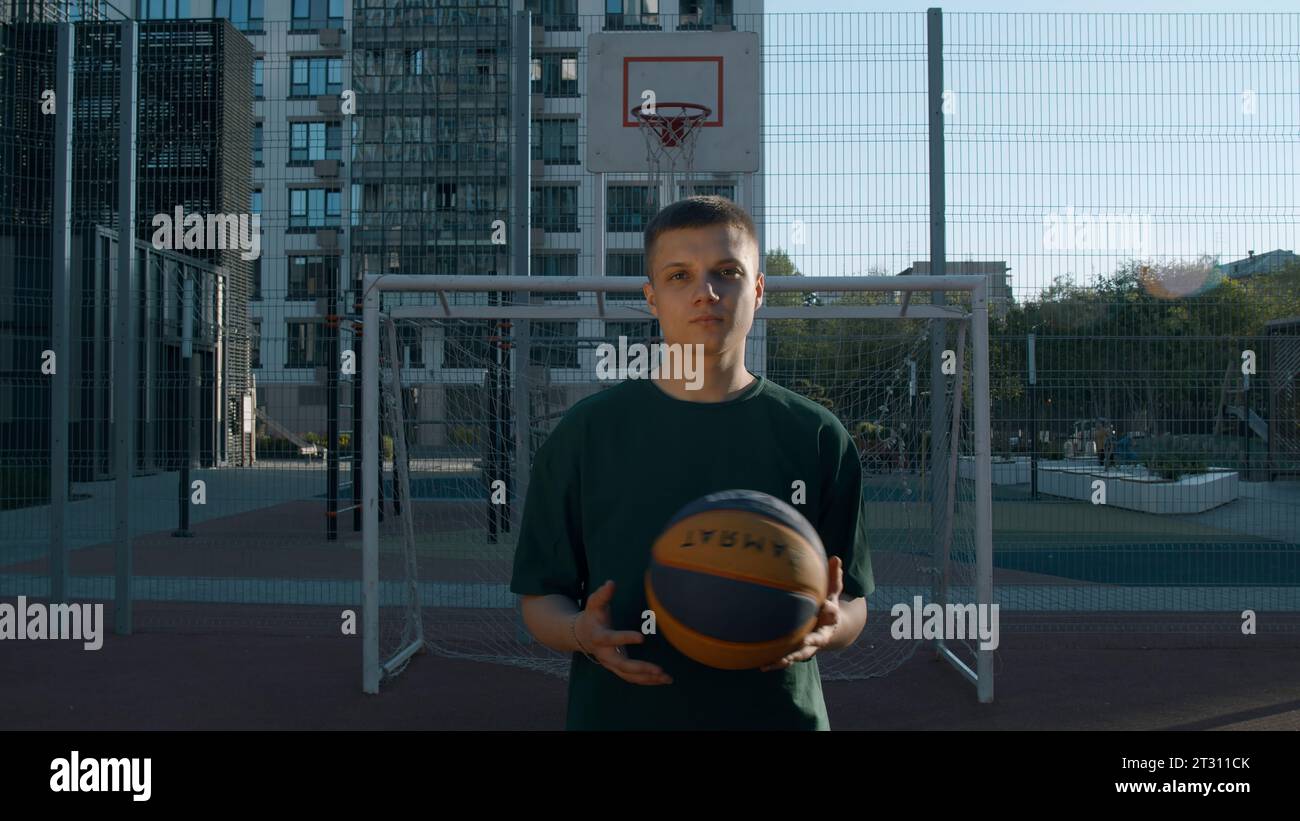 Young man jumping hitting volleyball hires stock photography and