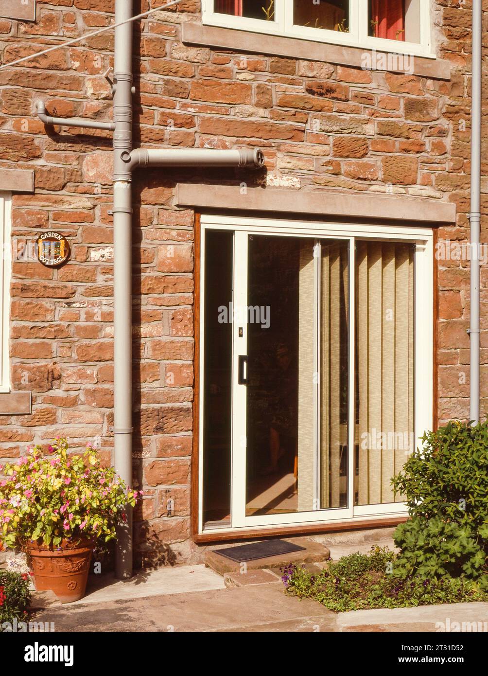 Patio sliding doors in a cottage Stock Photo Alamy