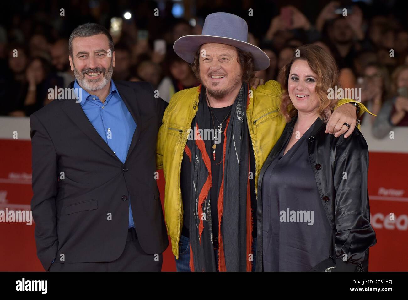 Rome, Italy. 21st Oct, 2023. ROME, ITALY - OCTOBER 21: ZGiangiacomo De Stefano, Zucchero Adelmo Fornaciari, Valentina Zanella attends a red carpet for the movie 'Fingernails' and 'Zucchero - Sugar Fornaciari' during the 18th Rome Film Festival at Auditorium Parco Della Musica on October 21, 2023 in Rome, Italy. Credit: dpa/Alamy Live News Stock Photo