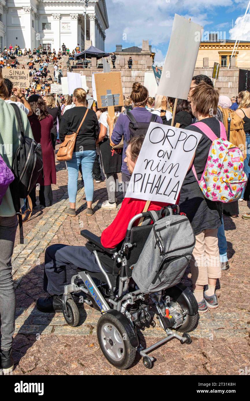 Orpo on niin pihalla. Person in a wheelchair with sign at Me emme vaikene! anti-racism demonstration in Helsinki, Finland. Stock Photo