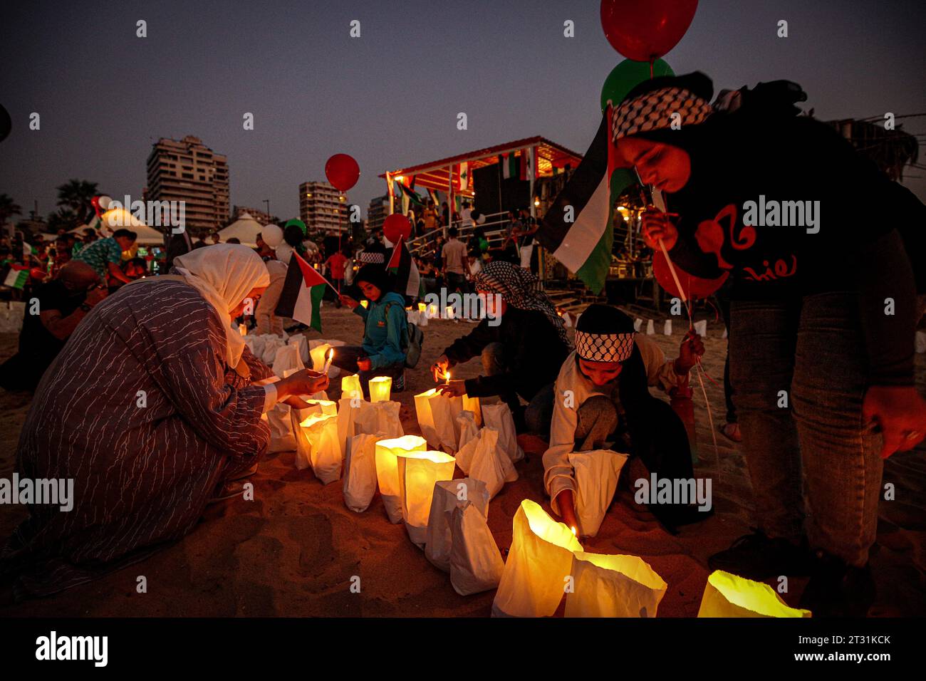 Beirut, Lebanon. 22nd Oct, 2023. Palestinian youths lit candles at the