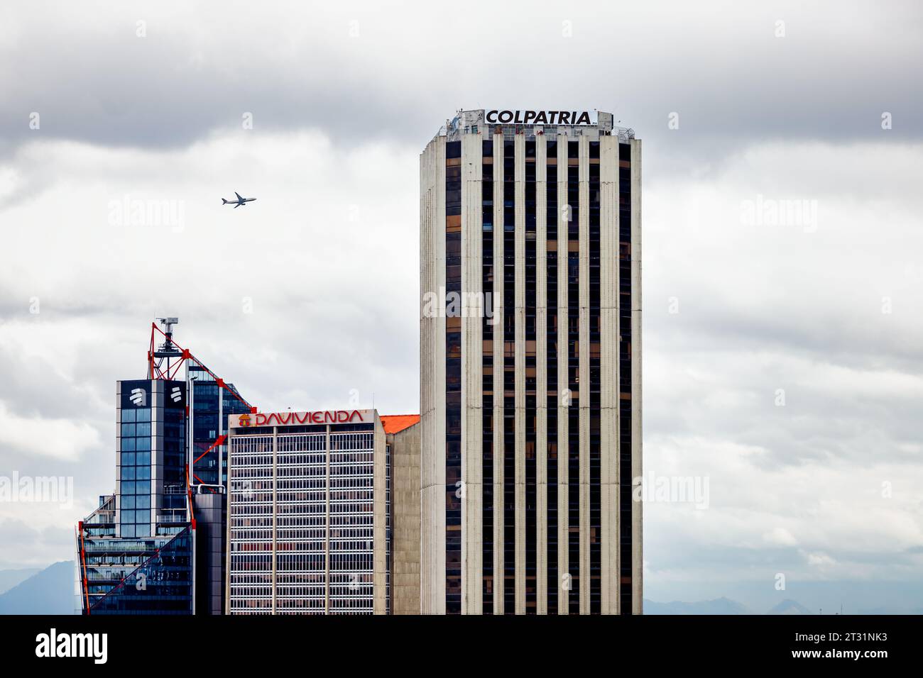 Bogota, Colombia January 23, 2023 Plane flies over the skyscrapers