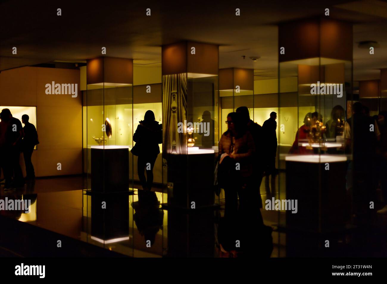 Bogota, Colombia - January 3, 2023: Visitors tour one of the exhibition rooms in the Gold Museum Stock Photo