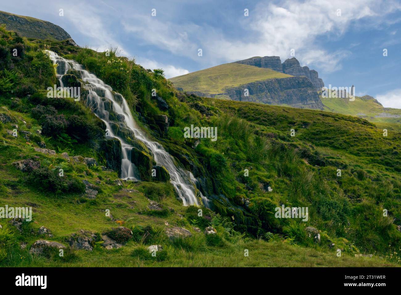 Bride's Veil Falls are a waterfall that cascades down the cliff face of the Trotternish Ridge, Isle of Skye, Scotland, resembling a bride's veil. Stock Photo