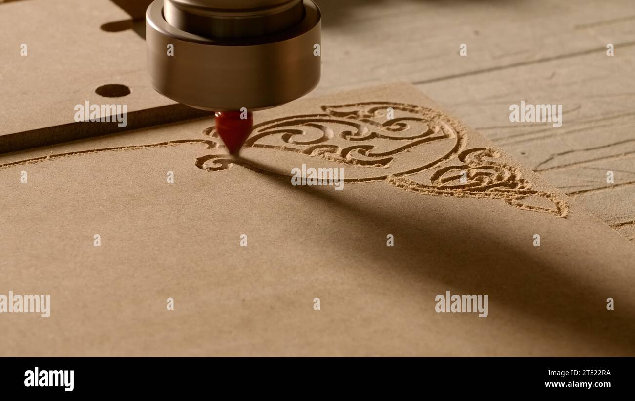 Drawings on wood. Creative. Sawing on a tree with a special cutter. Stock Photo